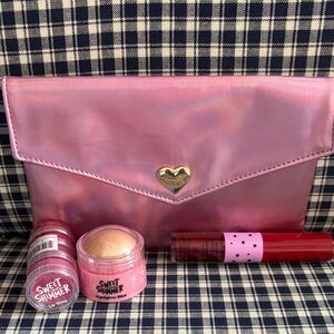 ipsy Pink makeup bag with Sweet Shimmer lip gloss, highlighter stick